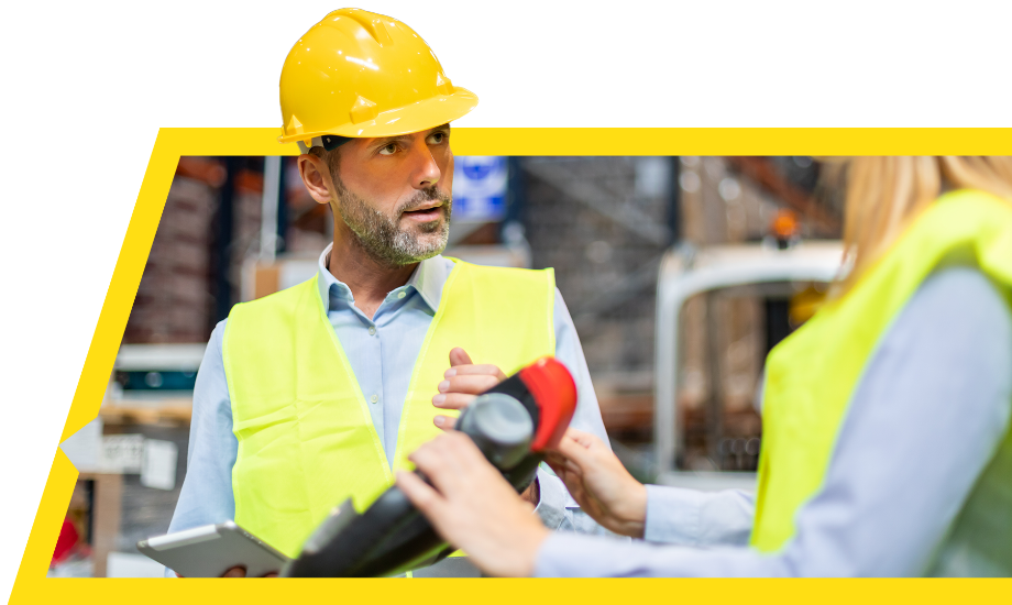 Man weating a high-viz jacket and hard hat